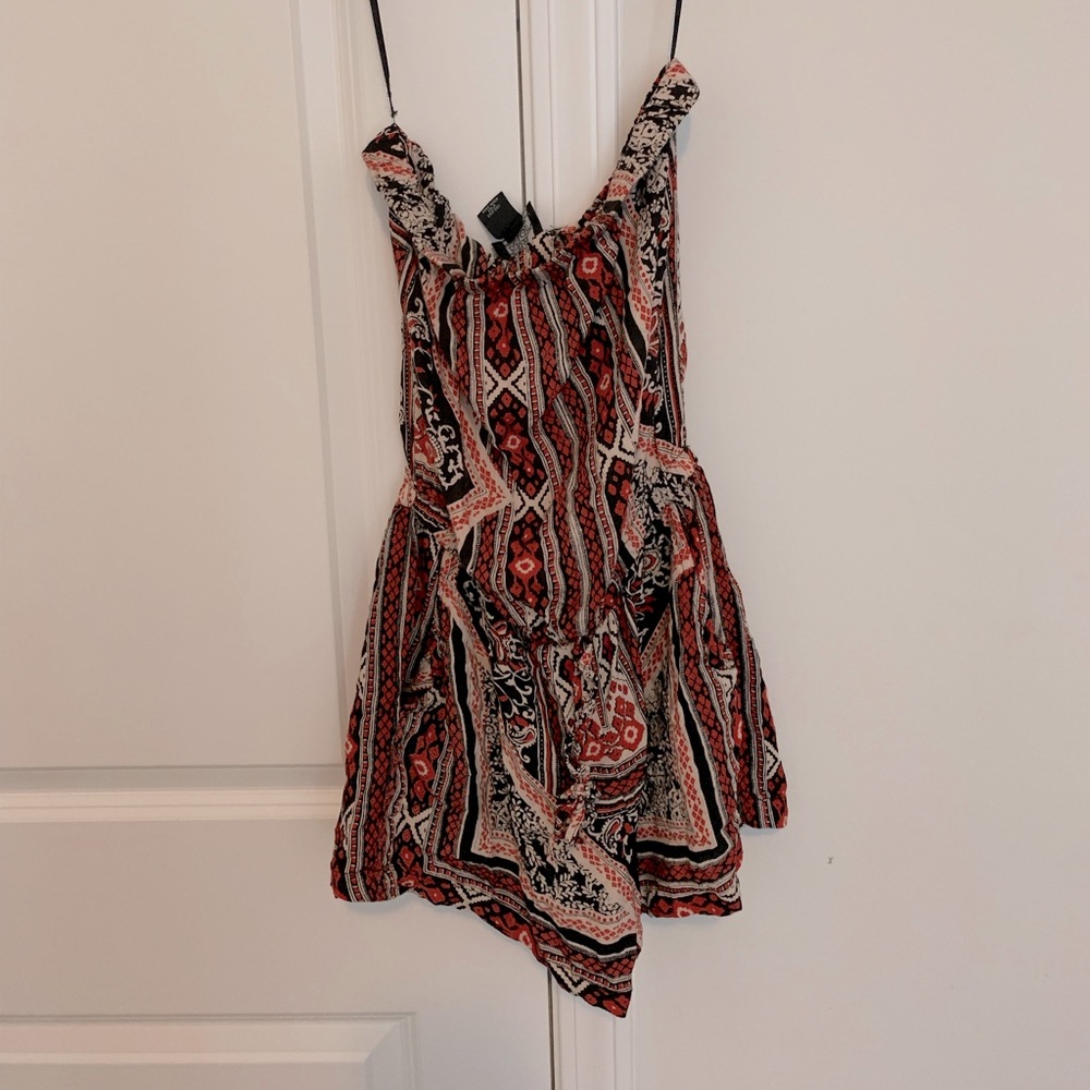 Sleeveless romper size small. Brand is Angie